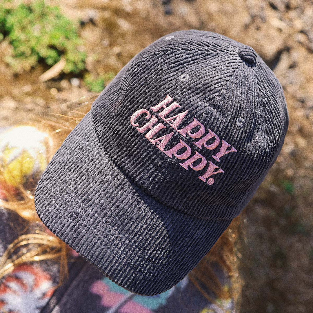 Kid wearing the Happy Chappy corduroy cap in carbon