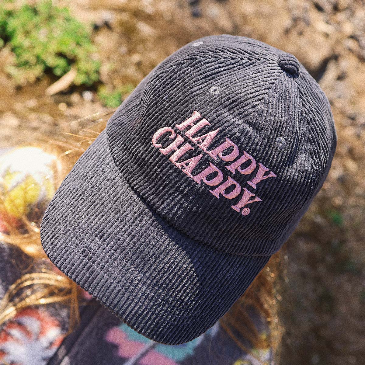 Kid wearing the Happy Chappy corduroy cap in carbon
