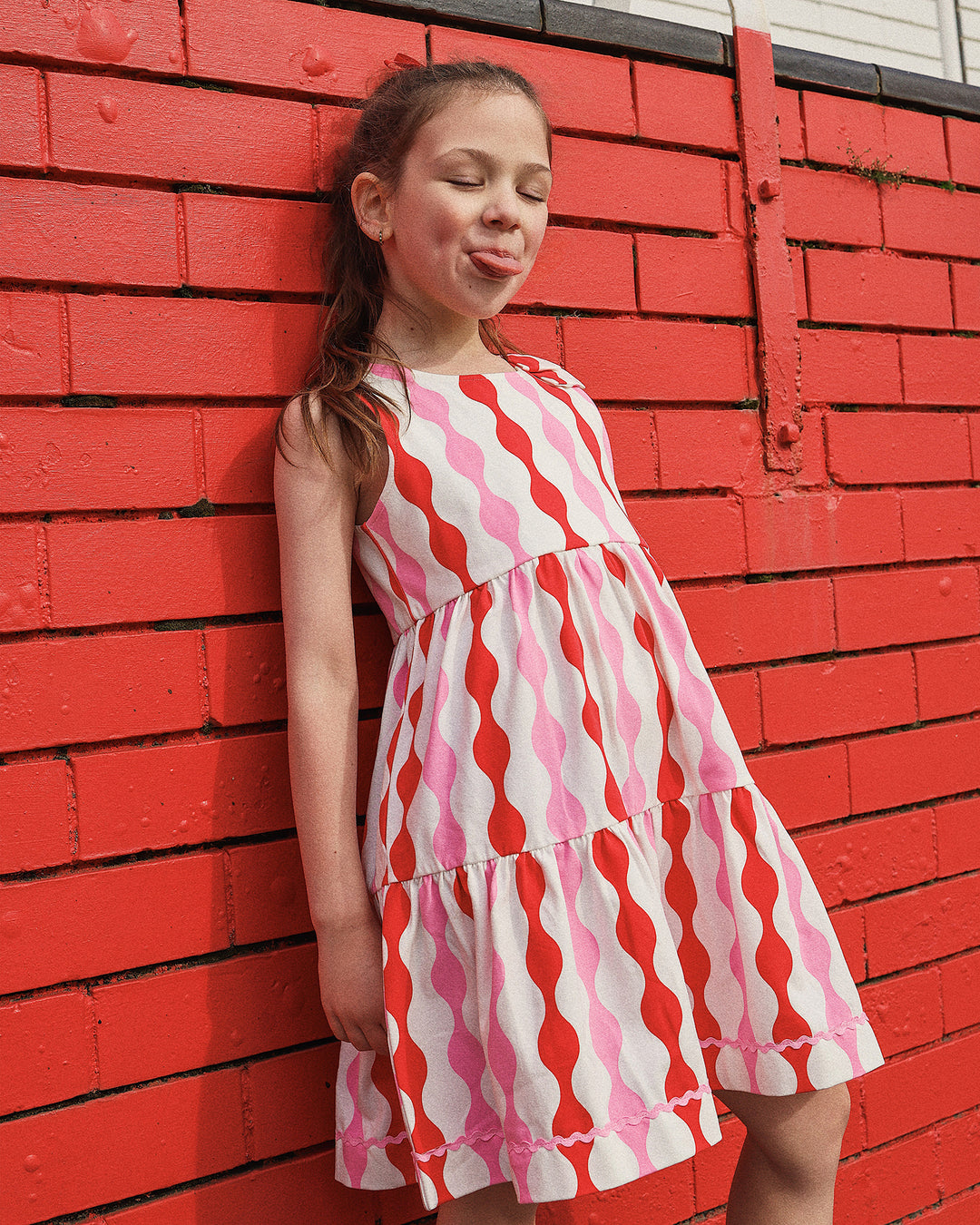 RIC RAC BOW DRESS IN PARTY PINK