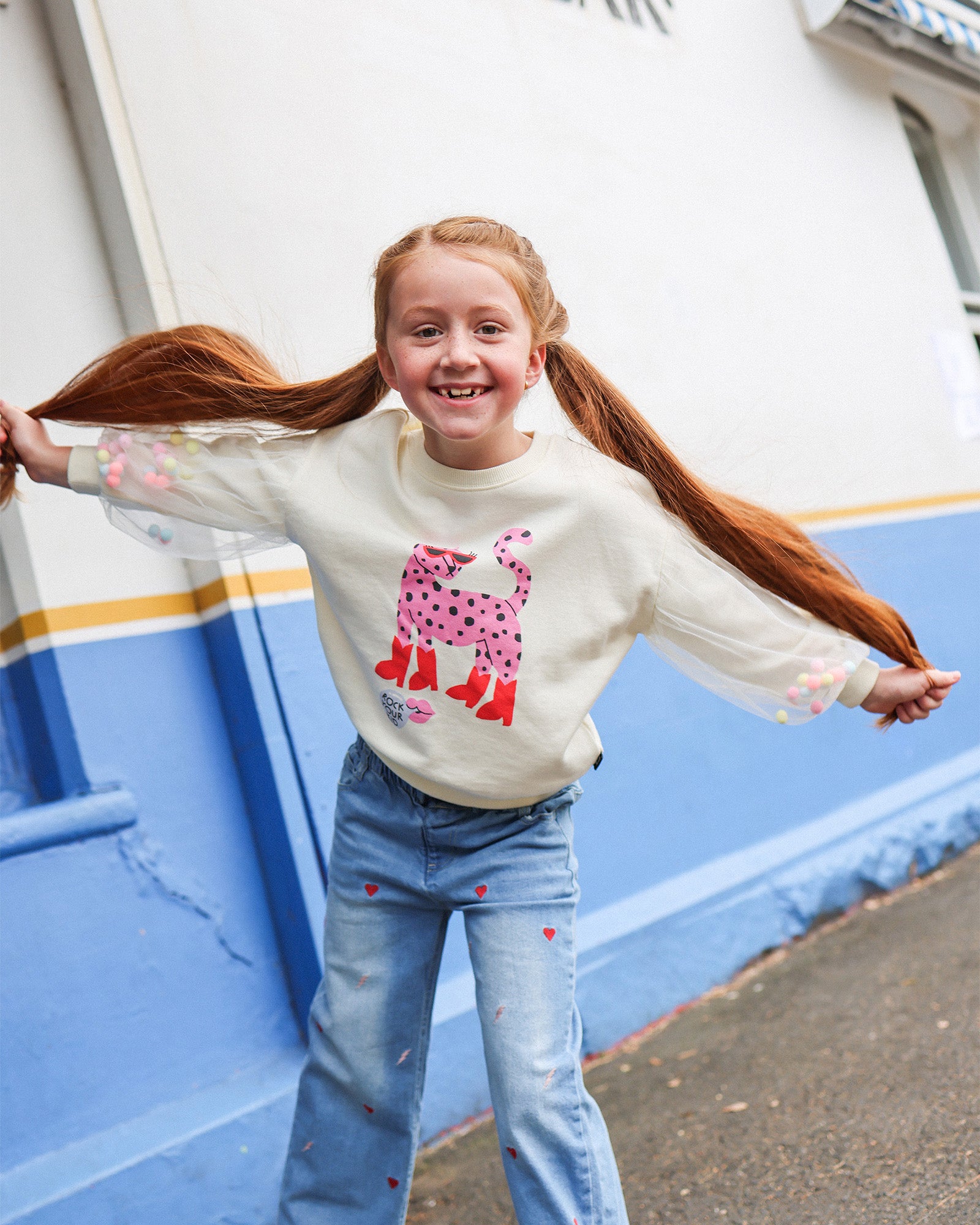 LEOPARD POM POM SWEATSHIRT