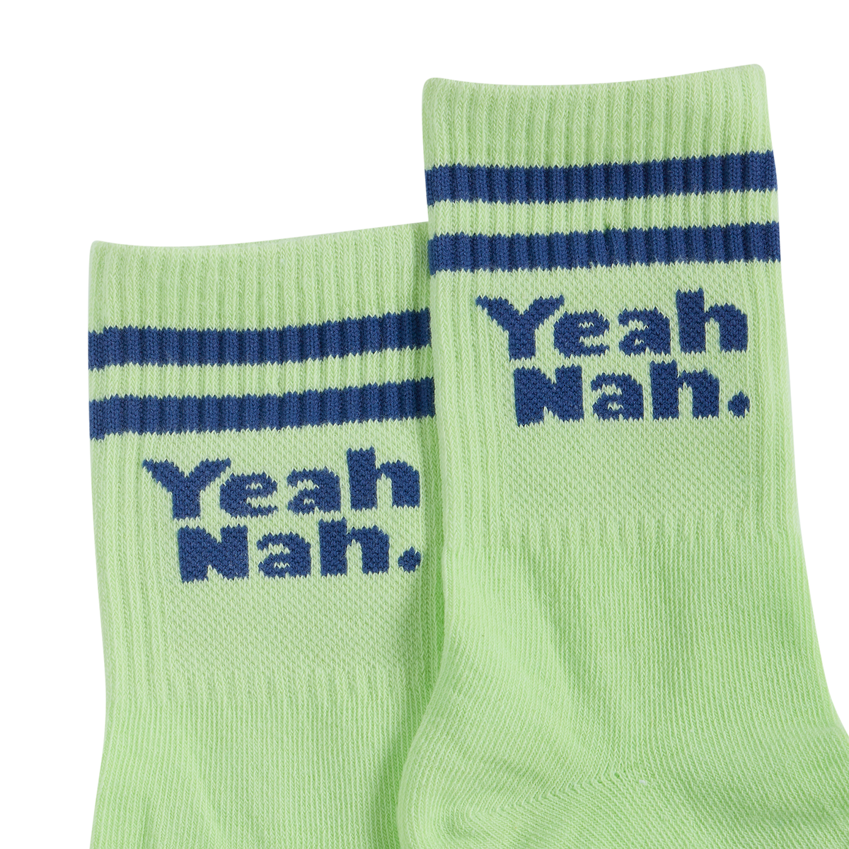 Pair of Yeah Nah kids crew socks in lime