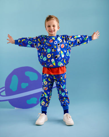 ROCK MY GALAXY FRENCH TERRY TRACK PANTS IN ROCKET BLUE