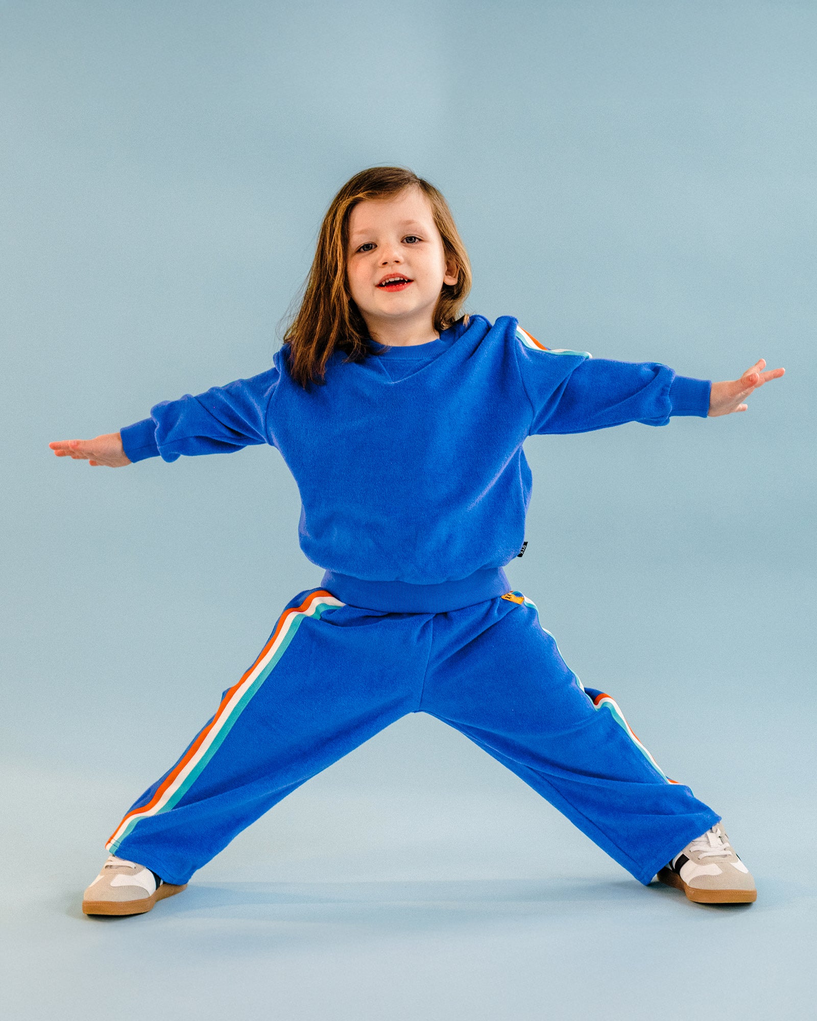 COSMIC POWERS TERRY TRACK PANTS IN NAVY