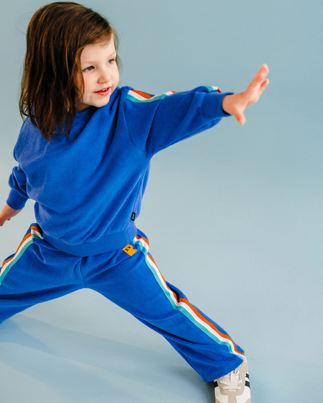 COSMIC POWERS TERRY TRACK PANTS IN NAVY