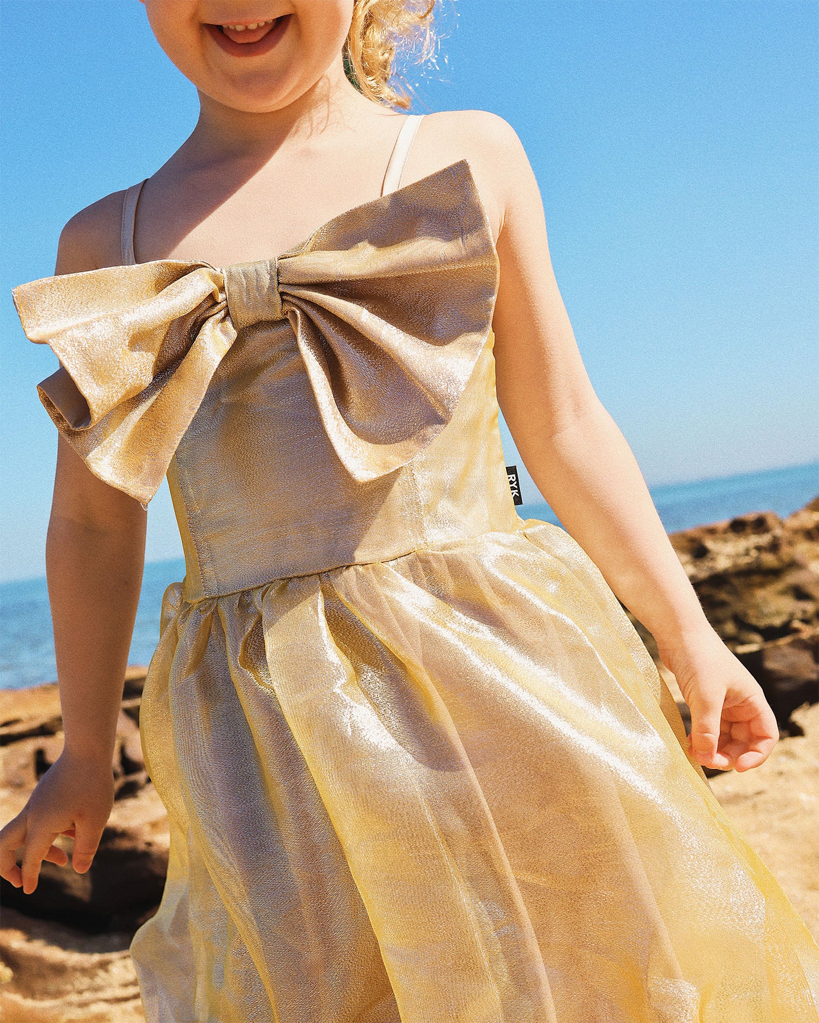 GIFT BOW DRESS IN GOLD