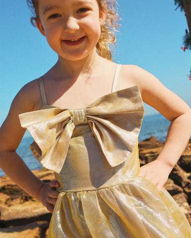GIFT BOW DRESS IN GOLD