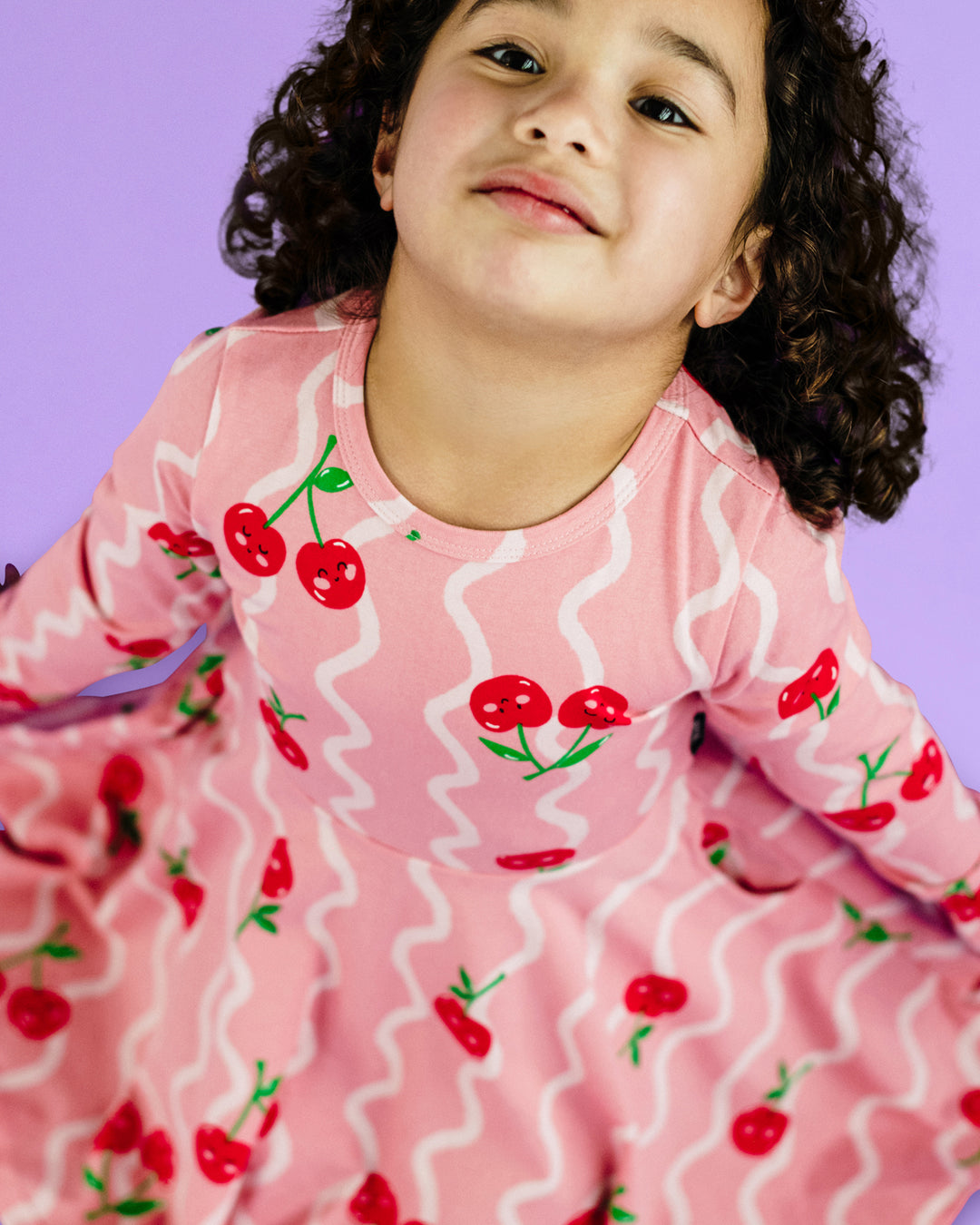 CHERRY SQUIGGLE WAISTED LONG SLEEVE DRESS