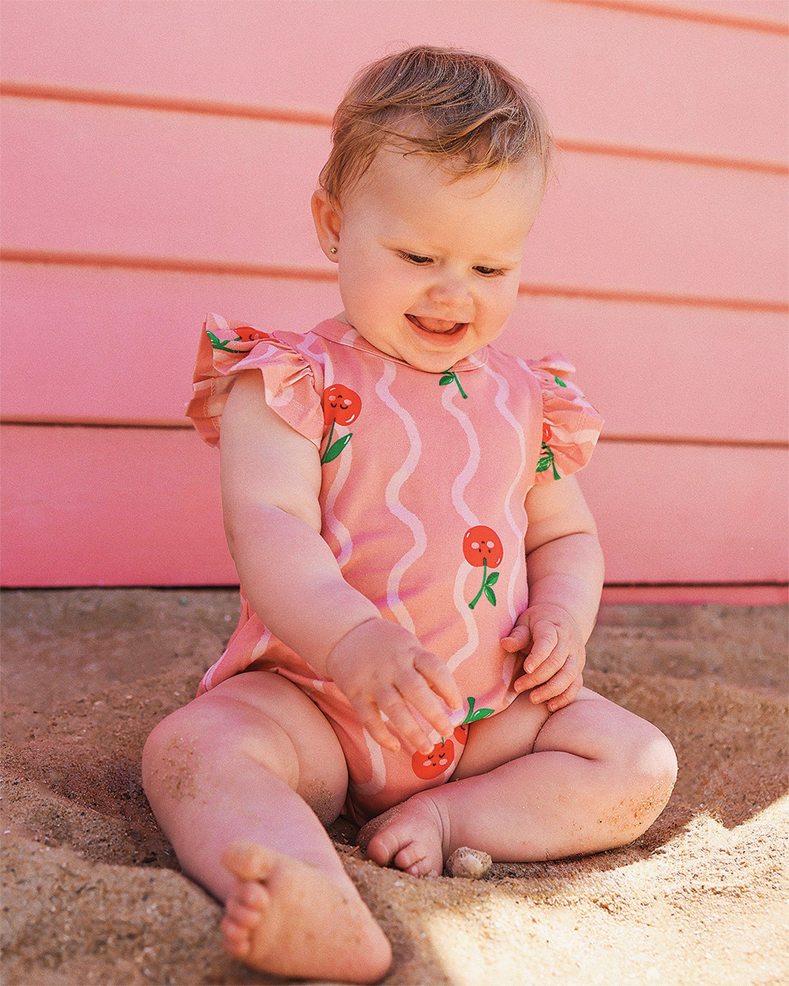 CHERRY SQUIGGLE BUBBLE BODYSUIT