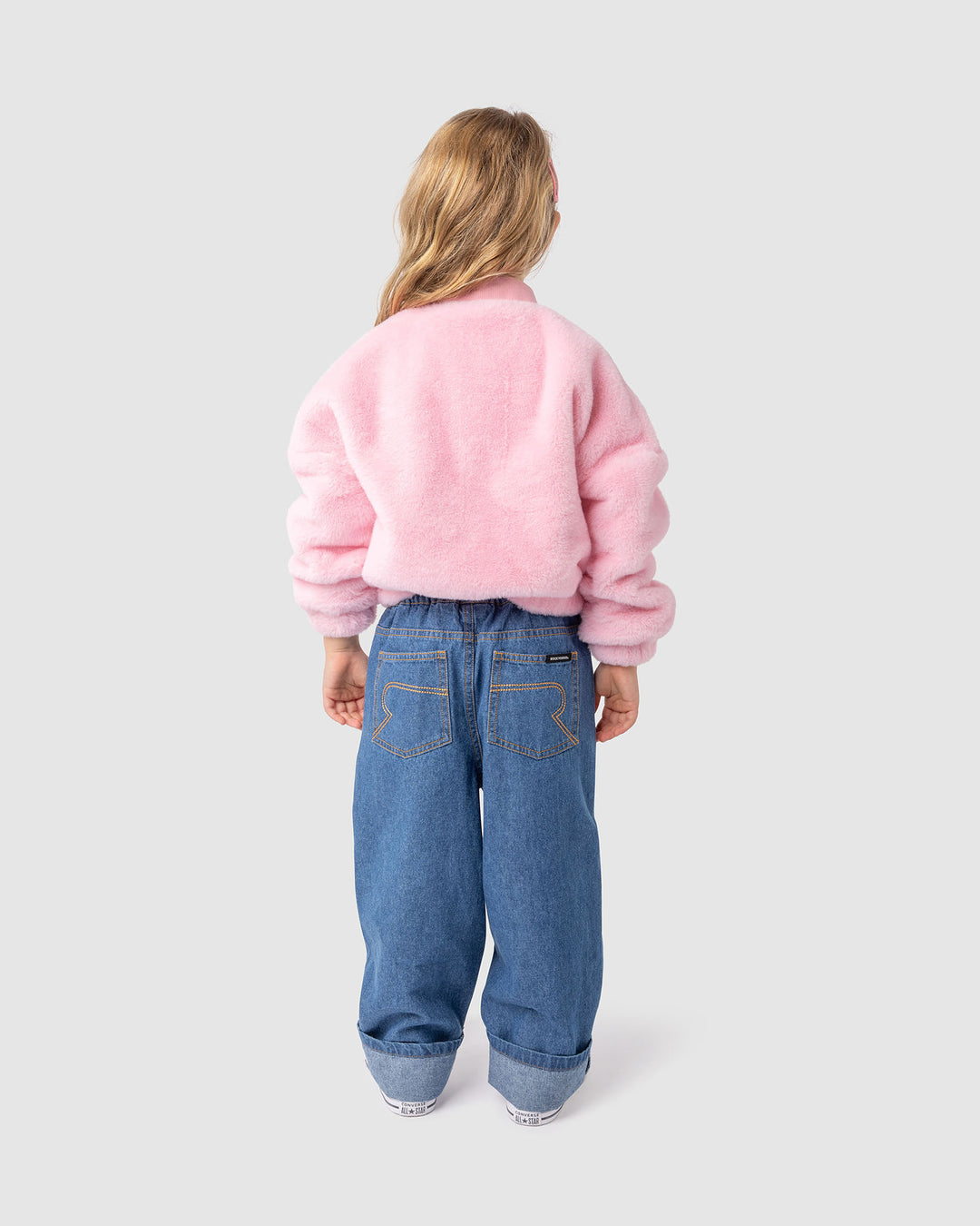 FAUX FUR RAINBOW BOMBER JACKET IN PINK