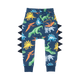A baby boy's DINO MANIA TRACK PANTS by Rock your Baby Online with dinosaurs on them.