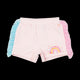 A Rock your Baby Online girl's pink and blue Rainbow Dreams Ruffle Shorts with ruffles and a rainbow.