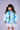 A little girl wearing an Elsa Magic Puffer Jacket from Rock your Baby Online.